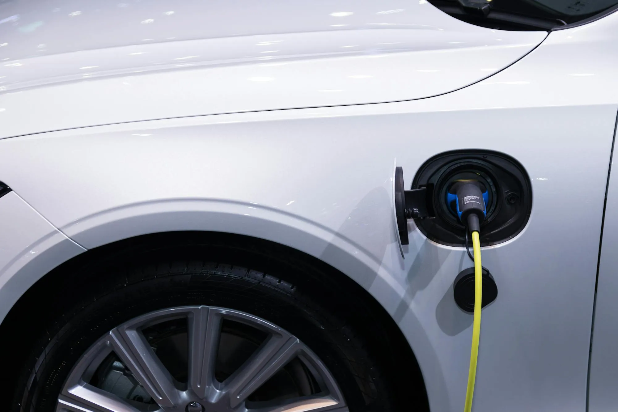 Type 2 charging cable plugged into the side port of an electric car